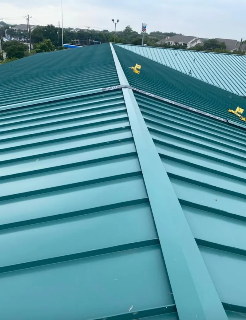 Green commercial metal roof ridge and valley for Metal Roof Repair in East Cleveland