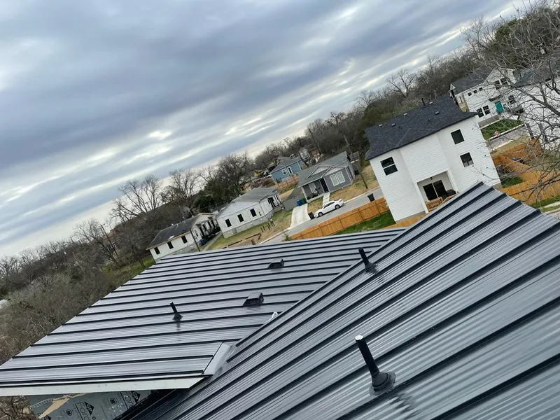 Standing seam metal roof panels with vents for Skylight Repair in East Cleveland